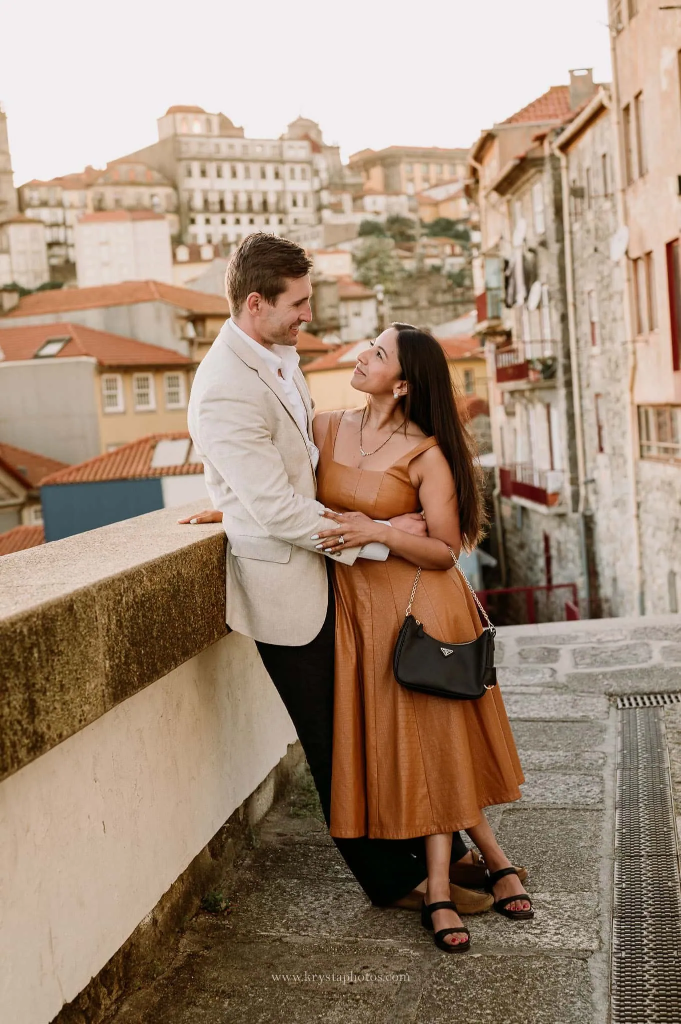Well-dressed couple during Porto engagement photoshoot, iconic Porto streets and monuments