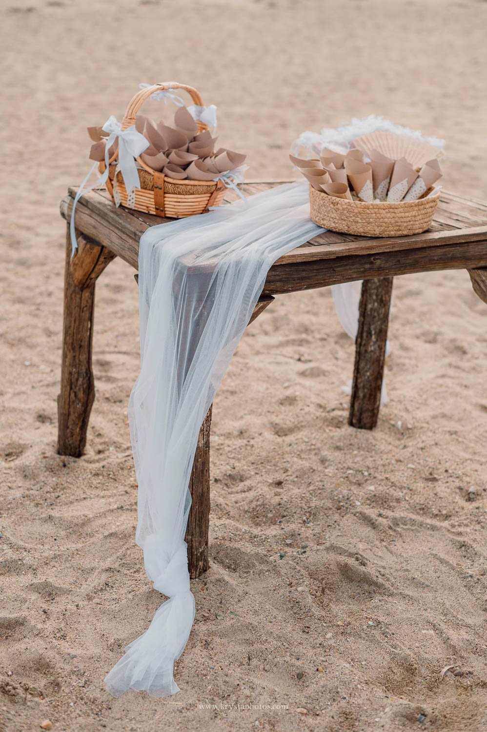 Greek island beach wedding table details with blue tile invitation and Mediterranean aesthetic