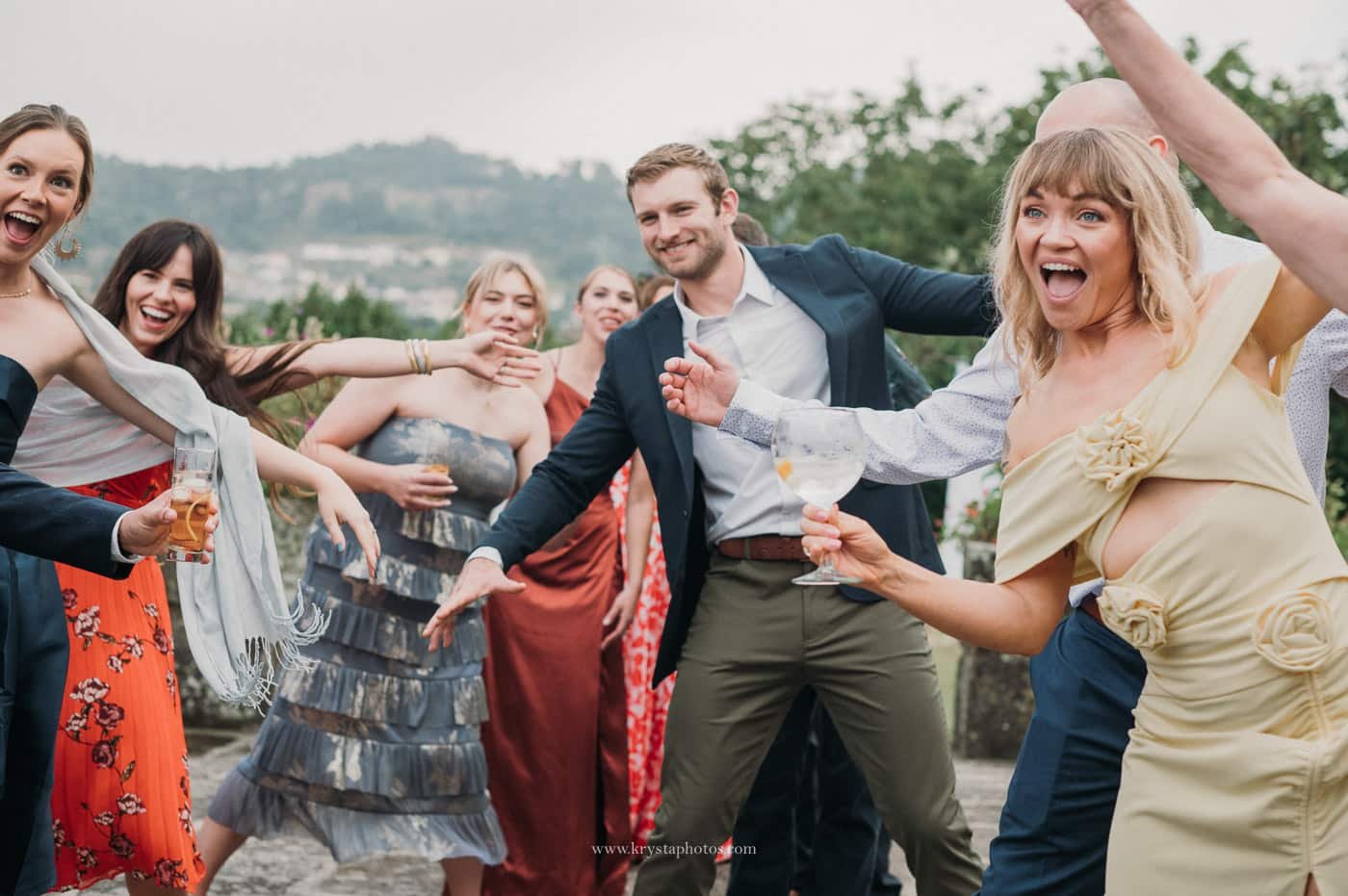 wedding guests enjoying cocktail hour during an intimate vineyard wedding in the Douro Valley Portugal